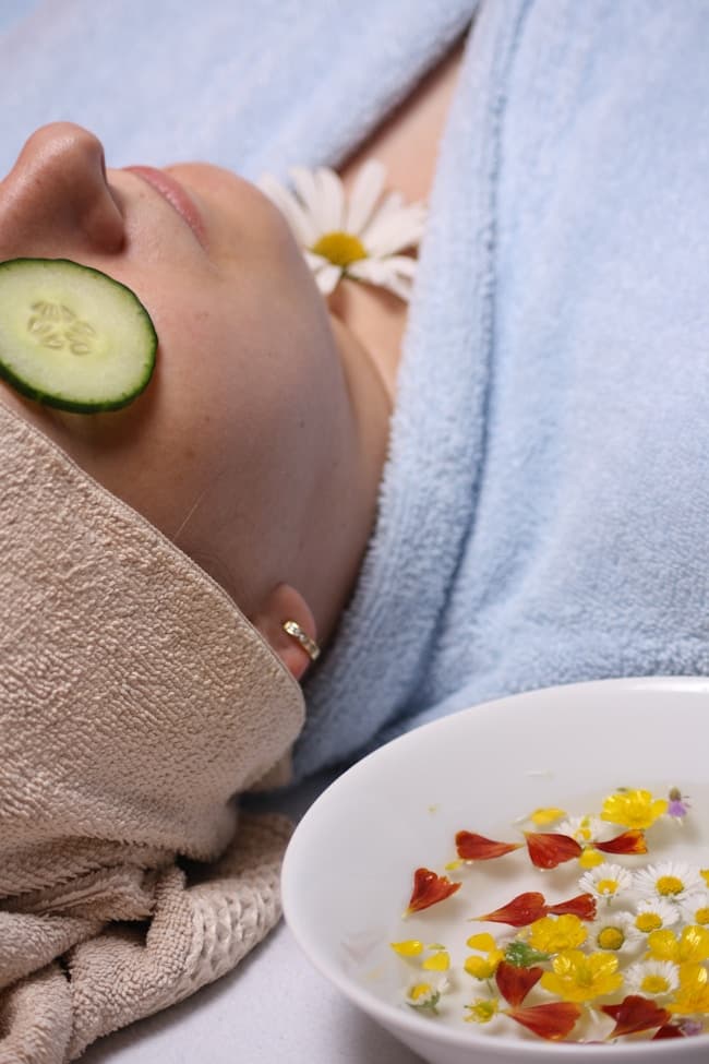 Spa treatment with cucumber and flowers